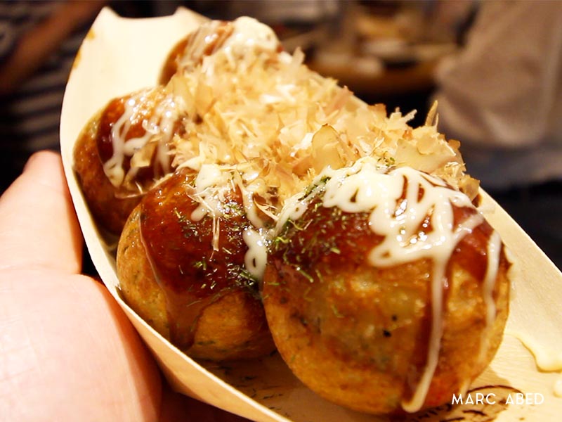 Tsukiji street food Takoyaki are ball-shaped Japanese snack